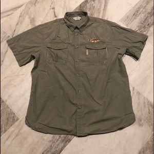 Columbia PFG green shirt.